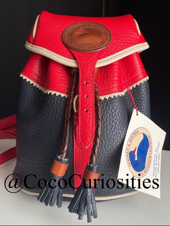 Dooney & Bourke Handbags - Dooney and Bourke Leather Teton mini Backpack awl multi color